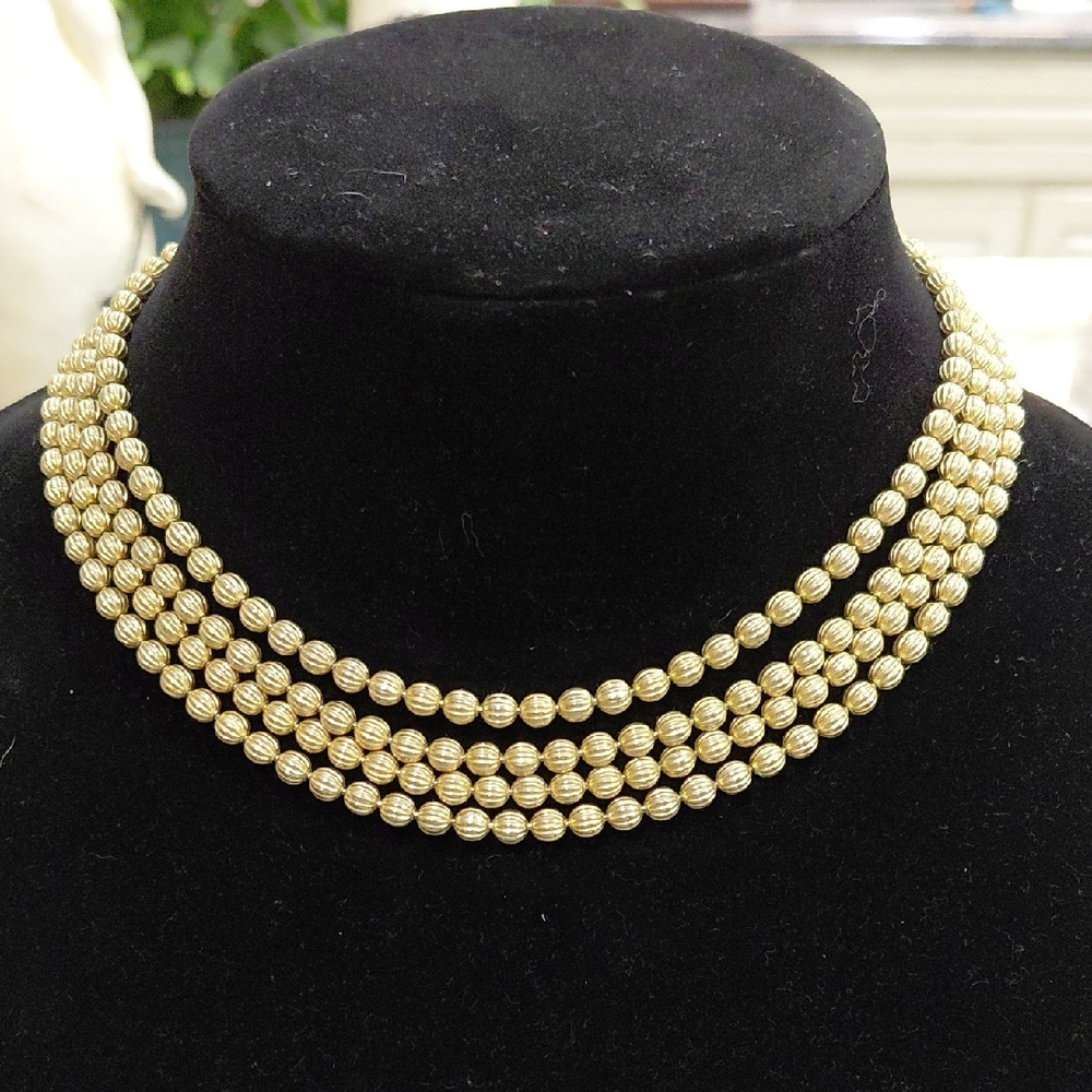 "Avon" 18in Vintage ,4 Strands of Connected Gold Tone Beaded Necklace.....